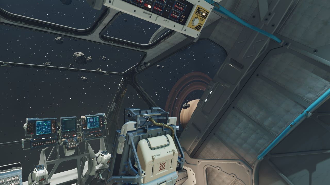 Image of the inside of a ship in Starfield. There is a planet which looks similar to Saturn outside of the spaceship and the player character is using photo mode in the game.