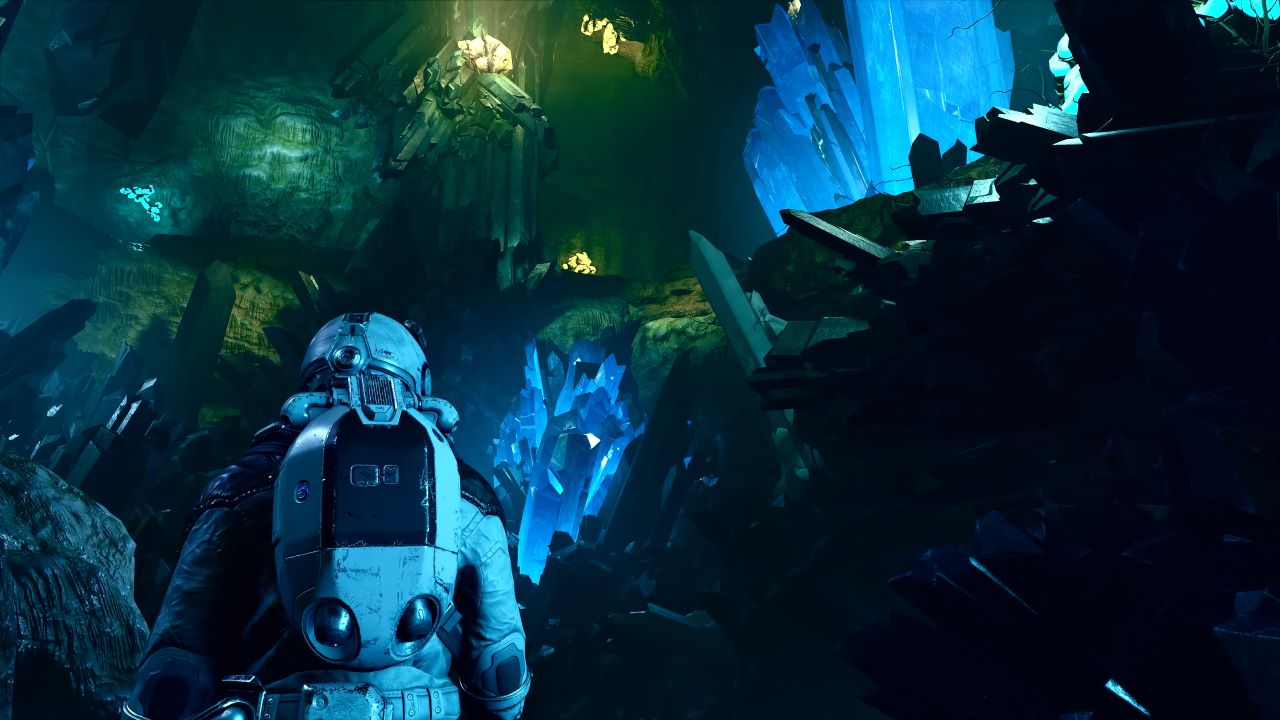 Image with a character walking through a glowing crystalline cave environment in Starfield.