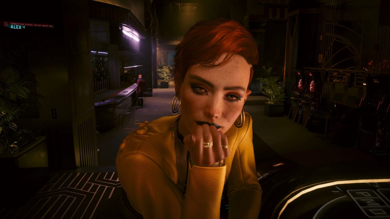 Image showcasing one of the twins in Cyberpunk 2077 at the Roulette table. There is a smirk on the character's face and a gold outfit worn.