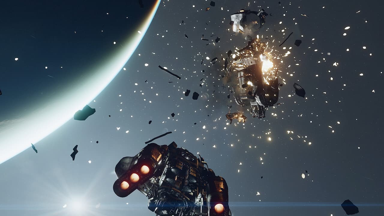 A ship blowing up another ship in Starfield; debris flies around.