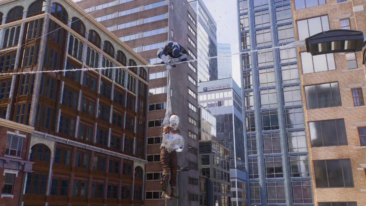 Miles performing a stealth takedown from a Web Line in the city in Spider-Man 2