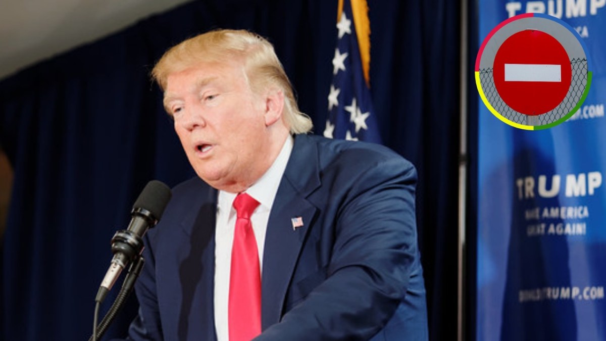 Donald Trump speaking into a microphone at a campaign event, with an inset image of a no-entry road sign in front of a chain-link fence.